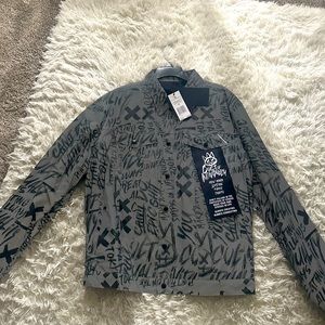 never worn Dark grey jacket reversible reflective color the details is insane
